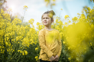 Girl standing in rape field - MOEF00003