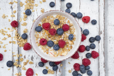 Bowl of granola with raspberries and blueberries - LVF06203