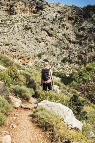 Greece, Crete, Kato Zakros, Gorge of the Dead, woman hiking stock photo