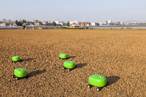 Five agricultural robots on a field - WDF04049