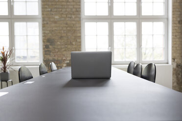 Laptop on conference table - RBF05749