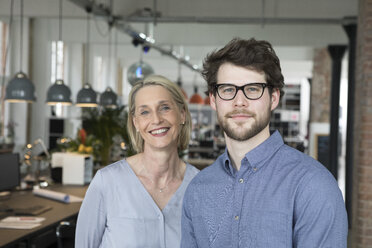 Portrait of a young businessman and mature a businesswomen - RBF05815