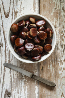 Sweet chestnuts in a bowl and knife - EVGF03247