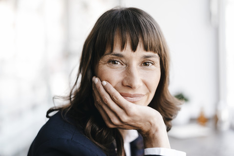 Businesswoman in cafe, smiling stock photo