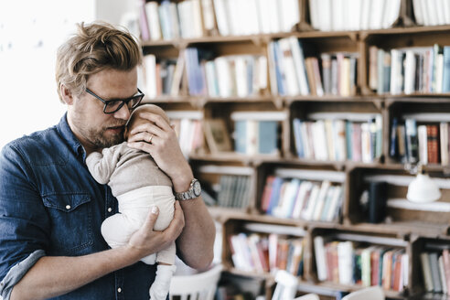 Father holding his baby girl - KNSF01983