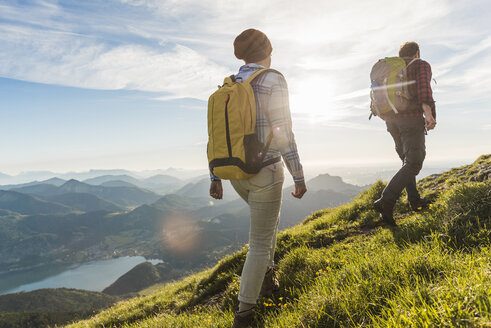 Couple hiking in the mountains - UUF10996