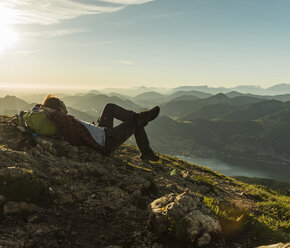 Hiker in the mountains taking a break - UUF11008