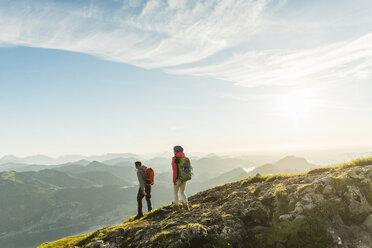 Couple hiking in the mountains - UUF11010