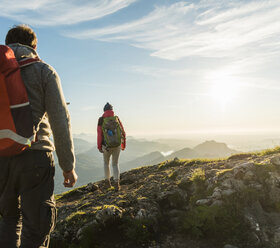 Couple hiking in the mountains - UUF11016