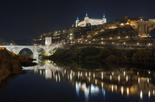 Spain, Toledo, view to lighted city at night - DHCF00088