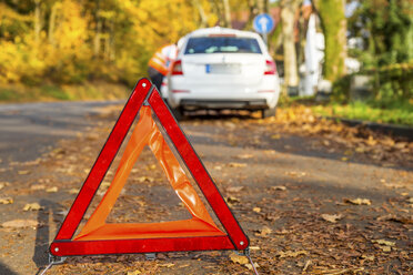 Warning triangle on the road by a car breakdown - PUF00652