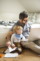 Father with his little son working from home - HAPF01959