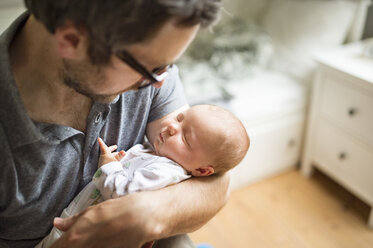 Father at home with his baby daughter - HAPF01990