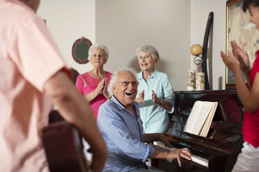 Elderly people making music in retirement home - ZEF14240