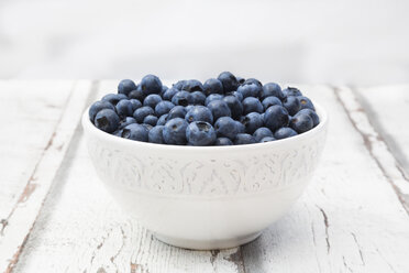 Bowl of blueberries on wood - LVF06245