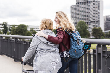 Grandmother and granddaughter having fun together - UUF11349