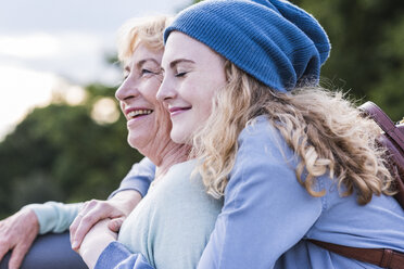 Happy young woman with her granddaughter - UUF11367