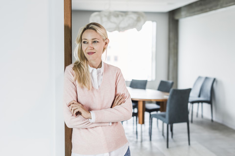 Confident businesswoman in office stock photo
