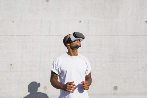 Man wearing Virtual Reality Glasses stock photo