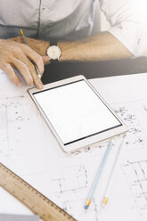 Architect working with tablet, close-up - GIOF03043