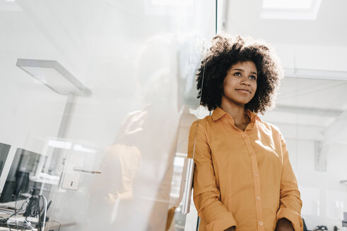 Portrait of young woman in office - KNSF02292