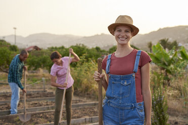 Portrait of smiling young farmer - PACF00077