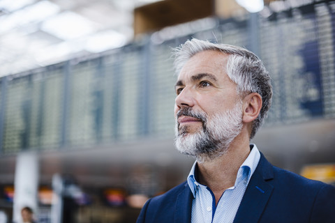 Portrait of confident businessman at a station stock photo