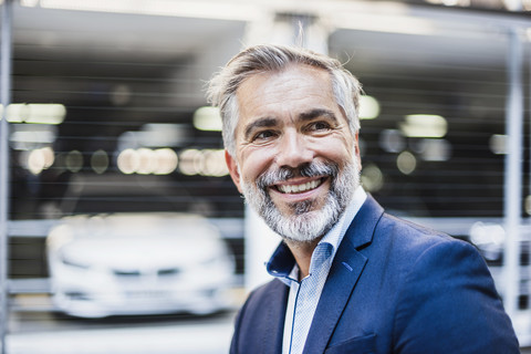 Portrait of smiling businessman stock photo