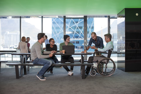 Group of people having a meeting in modern office stock photo