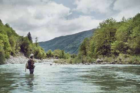 Slovenia, man fly fishing in Soca river - BMAF00308