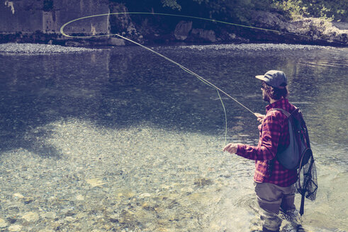 Slovenia, man fly fishing in Soca river - BMAF00317