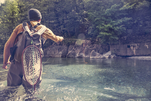 Slovenia, man fly fishing in Soca river - BMAF00318