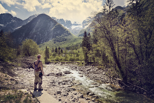 Slovenia, man fly fishing in Soca river - BMAF00342