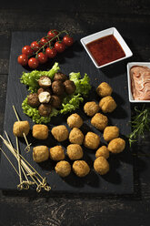 Meatballs and vegetable balls with dips on slate - MAEF12406