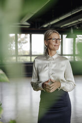 Portrait of confident businesswoman in office - JOSF01419