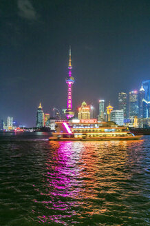 China, Shanghai, illuminated skyline of Pudong at night - THAF01975