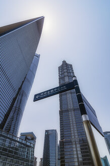 China, Shanghai, Lujiazui, skyscrapers and sign post at financial district - THAF01978