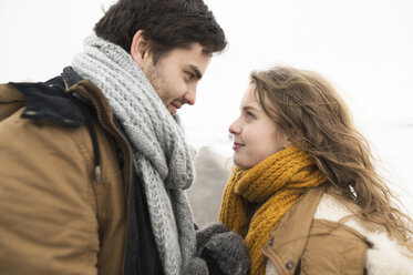 Young couple in love face to face in winter - HAPF02060