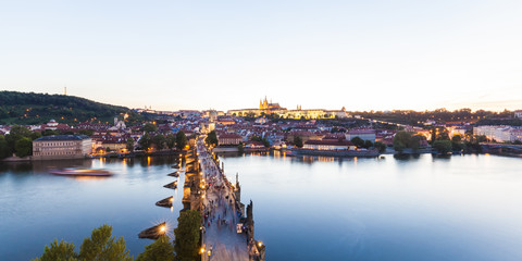 Czech Republic, Prague, cityscape with Hradcany, Charles Bridge and tourboat on Vltava stock photo