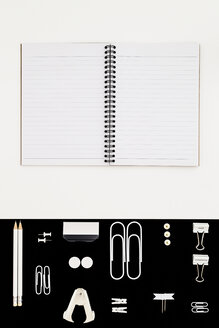 White office utensils on black background and notepad on whilte background - MELF00188