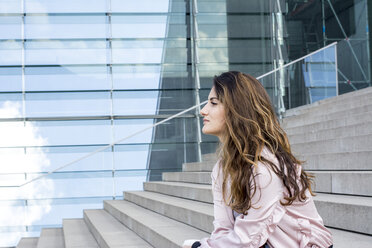 Young woman sitting on stairs - LMF00779