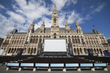 Austria, Vienna, view to city hall with empty screen and rows of seats in the foreground - ABOF00252