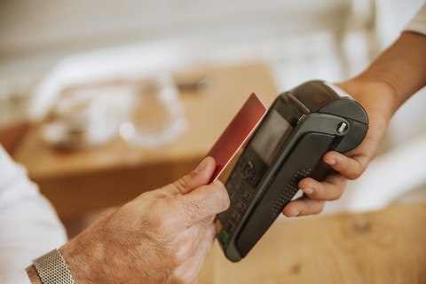 Contactless payment in cafe stock photo