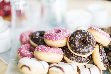 Various doughnuts with different icings and granules - CHPF00428