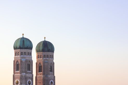 Germany, Munich, view to spires of Cathedral of Our Lady at twilight - MMAF00136