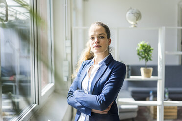 Portrait of confident businesswoman in a loft - JOSF01755