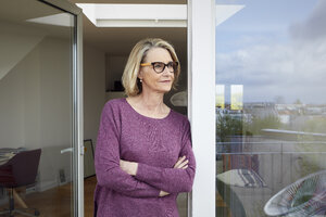 Portrait of confident mature woman on balcony - RBF06032
