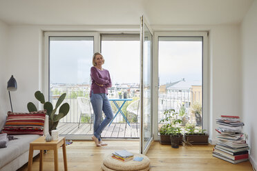 Portrait of smiling mature woman at home - RBF06044