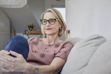 Mature woman at home on the sofa - RBF06067