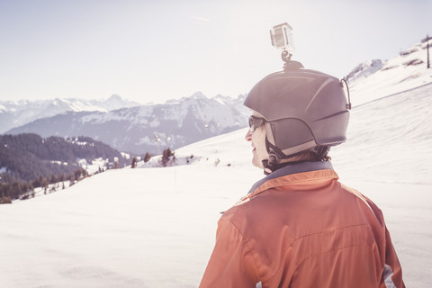 Austria, Damuels, skier with action cam in winter landscape stock photo